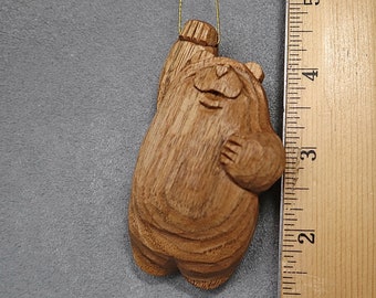 Carved wood bear ornament, original design, collectible, miniature, hand carved, made in America. Each happy bear is artist signed, dated.