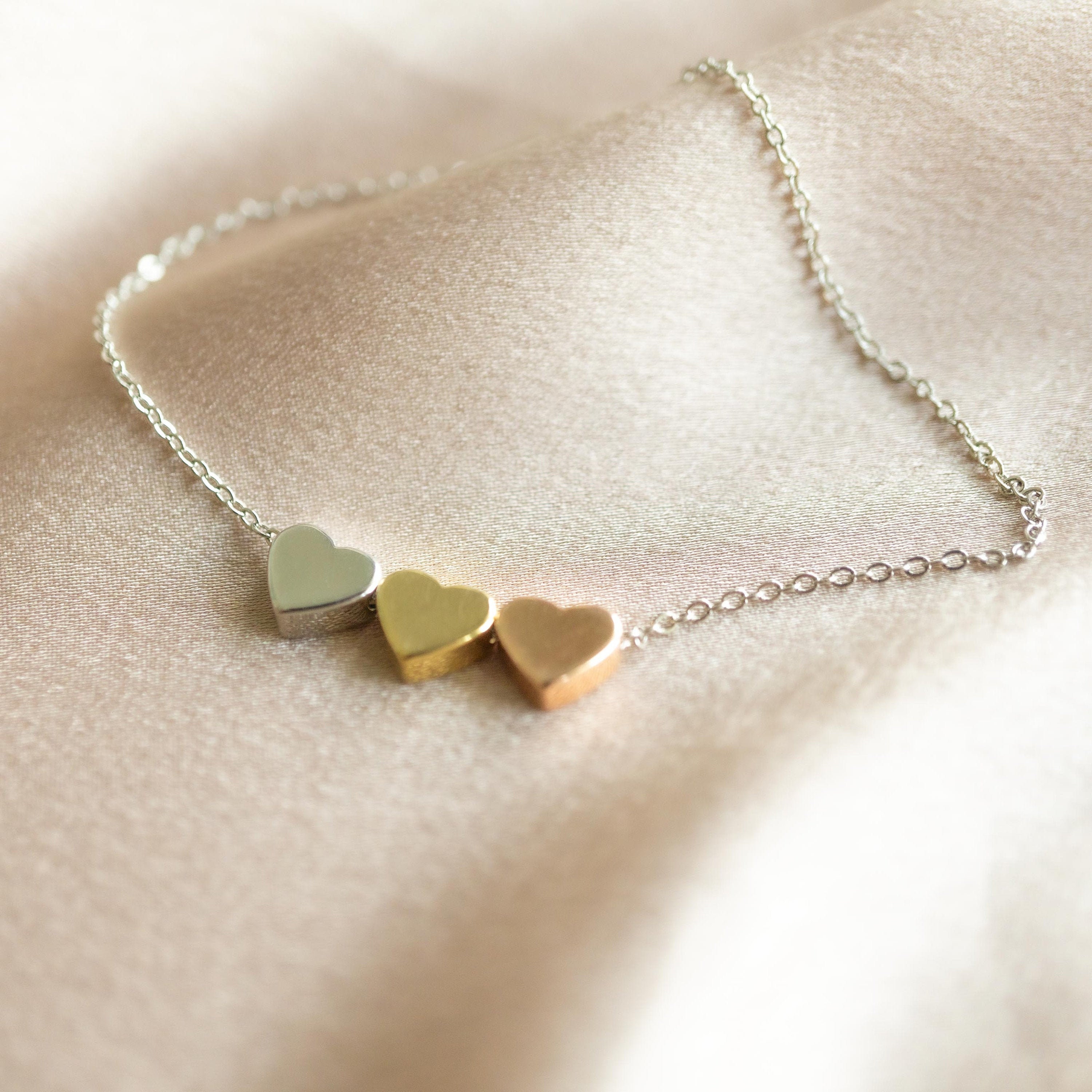 Personalised triple store heart necklace