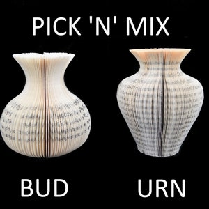 May include: Two book page vases, one shaped like a bud and the other shaped like an urn. The text "PICK 'N' MIX" is above the vases and the text "BUD" and "URN" are below the vases.
