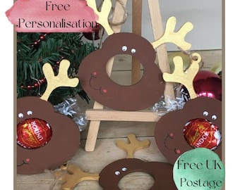 Gepersonaliseerd kerstcadeau, lindt lindordecoratie, kerstdecoratie, handgemaakte decoratie, kousvullers, rendierdecoratie.