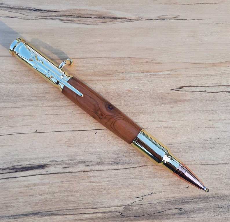 Bolt action handmade pen writing pen Australian walnut tree. gold