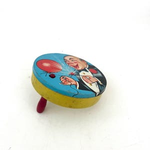 Tin Noise Maker Vintage Tin Toy Balloon Popping Man Twirling Noisemaker Grogger
