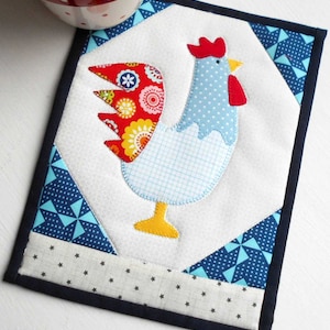 Patrón de tapete para taza con forma de gallo