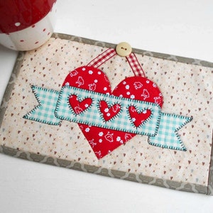 Motif bannière, mug, coeur, tapis