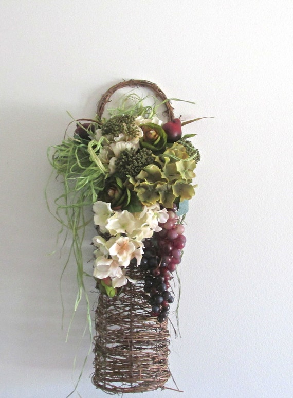 Items similar to Grapevine basket with beautiful silk flowers