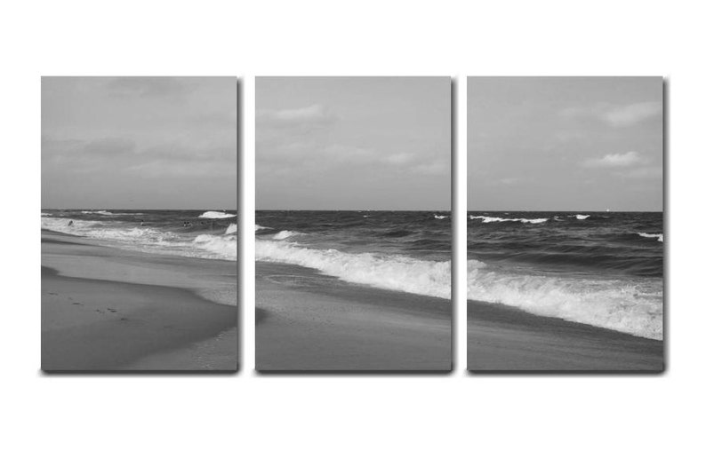 May include: A black and white photograph of a beach scene with waves crashing on the shore. The photo is split into three panels.