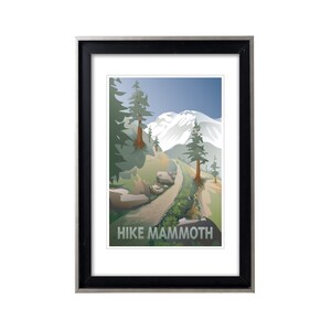 May include: A framed illustration of a mountain landscape with a dirt path leading up to a snow-capped mountain peak. The text "HIKE MAMMOTHE" is printed at the bottom of the image.
