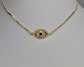 A Jeweled Evil Eye Pendant with Emerald CZ, Simulated Sapphires & Blue Opal's on 18k gold filled Sunburst Chain