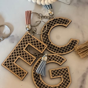Rattan style keychain with leather tassel