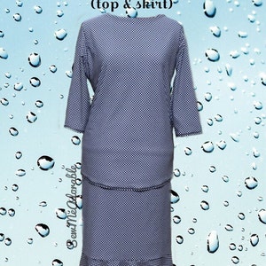 May include: A navy blue and white gingham print swimwear set consisting of a long-sleeve top and a matching skirt with a ruffled hem. The text Kenadee swimwear (top & skirt) and BemMeAdor&aacute;vel are visible on the image.