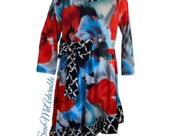 Create your own.  The Sadie Asymmetrical Ruffle Top for girls