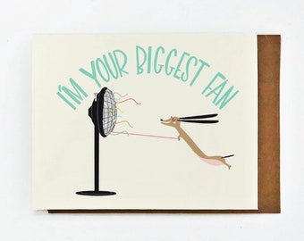 Biggest Fan Greeting Card: An Adorably illustrated Dachshund humorously being blown away by a fan