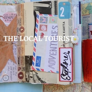 May include: A collage featuring the text "THE LOCAL TOURIST" and the word "ADVENTURES" on an envelope. A dried leaf and a travel guide are also visible. The collage has a vintage aesthetic.