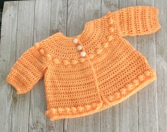 Orange baby cardigan. Ready to Ship in size 3-6 months