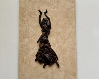 Dancer. Pebble mosaics. Pebble art.