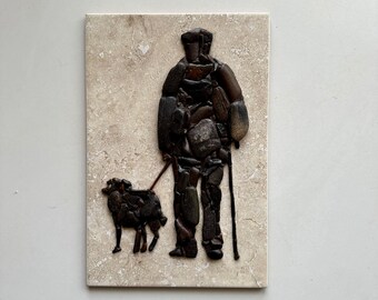 Old man and his dog. Pebble mosaics. Pebble Art.