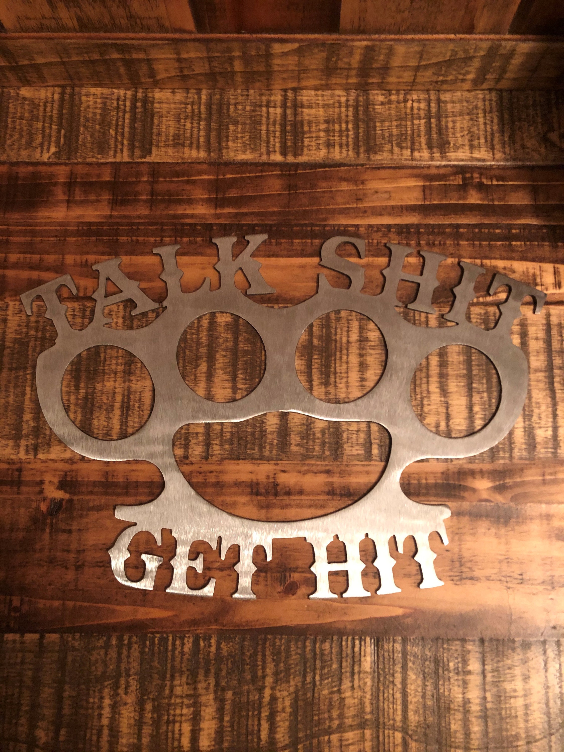 Talk Shit Get Hit Brass Knuckles Wall Sign