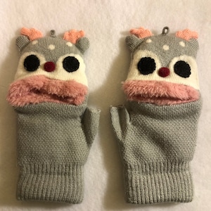 Children’s unisex convertible soft knit blue reindeer mittens/half gloves.
