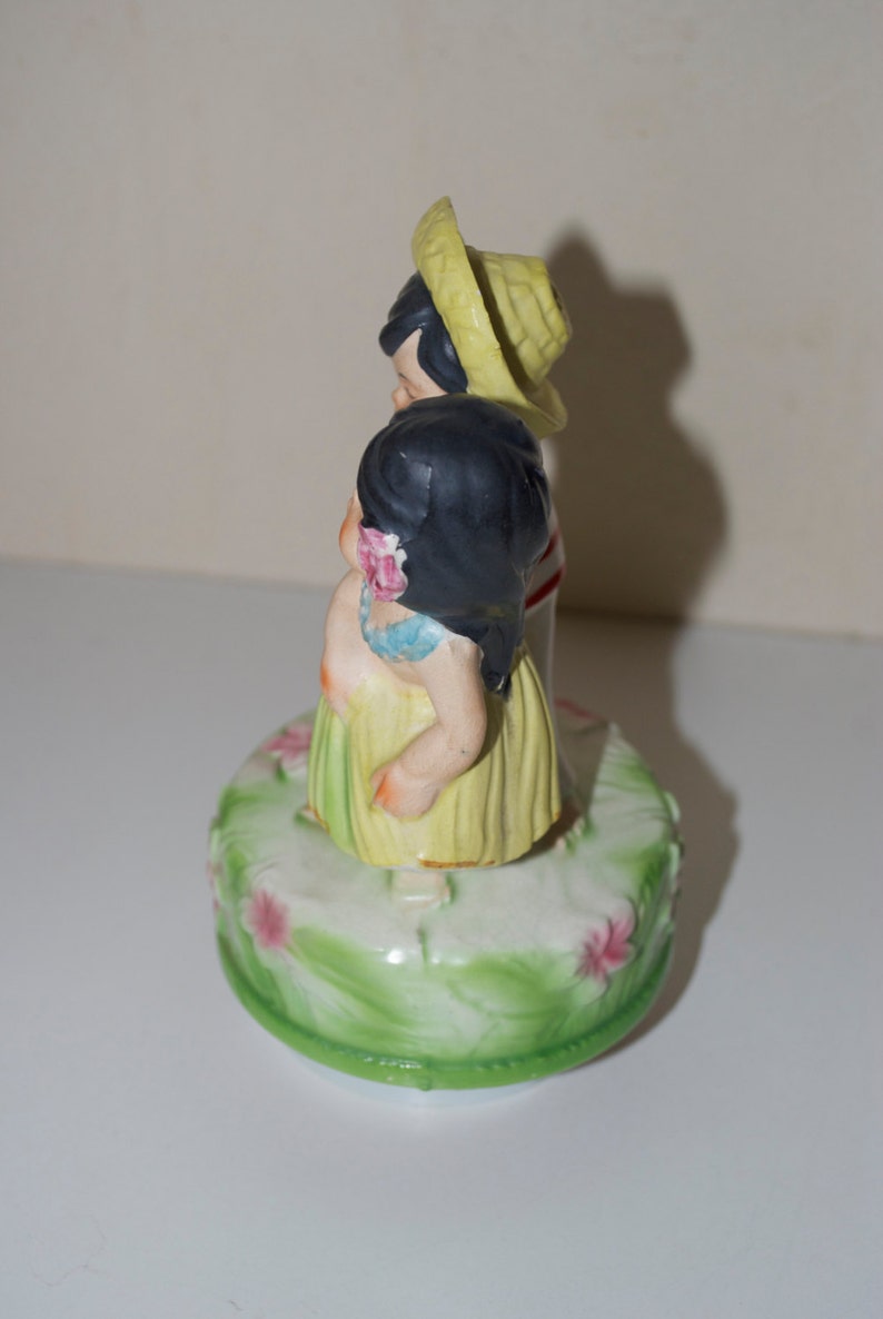 Hawaiian Couple Revolving Ceramic Music Box Hula Girl Ukulele Tiny Bubbles