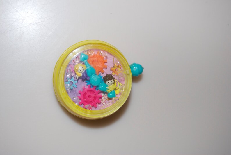 yellow polly pocket