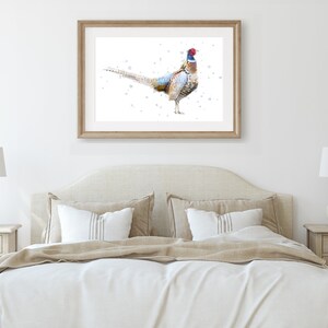 May include: A watercolor painting of a pheasant with brown, white, and blue feathers. The pheasant is standing on a white background with a few blue dots.