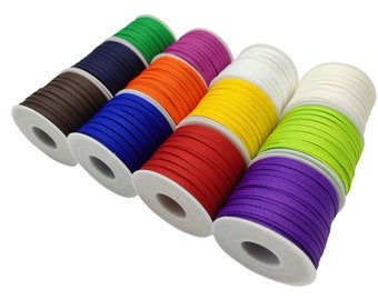 May include: Eight spools of colorful thread, each wound on a white plastic spool. The colors are brown, blue, orange, pink, green, yellow, white, and purple.