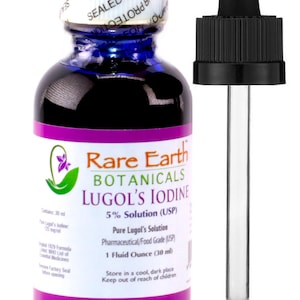 May include: A glass bottle with a blue cap containing a dark liquid. The bottle is labeled "Rare Earth Botanicals Lugol's Iodine 5% Solution (USP)". The label also states "Pure Lugol's Solution Pharmaceutical/Food Grade (USP) 1 Fluid Ounce (30 ml)". The bottle has a dropper attached to the cap.