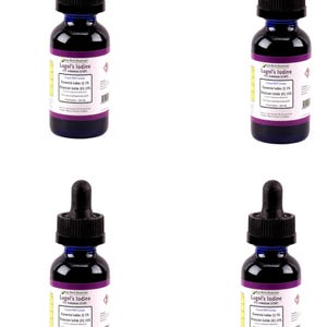 May include: Four bottles of Lugol's iodine solution, each with a black dropper and a dark blue glass bottle. The label includes text about the solution's composition and concentration. The liquid inside is a deep purple color.