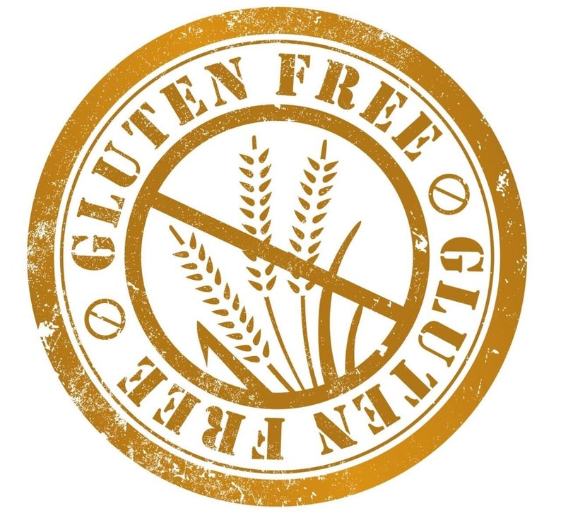 May include: A distressed, circular stamp in shades of gold and brown, featuring the words "GLUTEN FREE" in a circular pattern. The center shows wheat stalks crossed out with a diagonal line, indicating a gluten-free product.