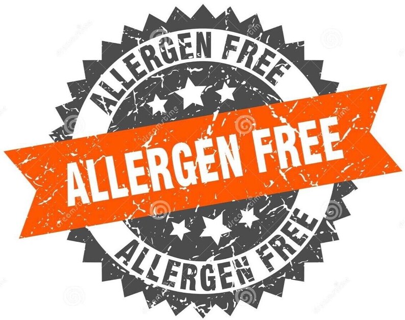May include: A gray and orange allergen-free seal. The seal has a circular design with the words "ALLERGEN FREE" in white text. An orange banner with the words "ALLERGEN FREE" is across the center. The seal has a distressed, textured appearance.