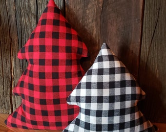 May include: Two Christmas tree-shaped pillows, one red and black buffalo plaid and one black and white gingham.