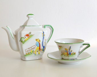 Vintage Porcelain Child's Teapot and Teacup Set