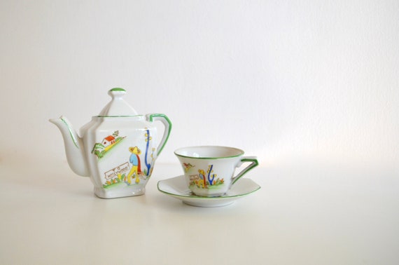 Vintage Porcelain Child's Teapot and Teacup Set