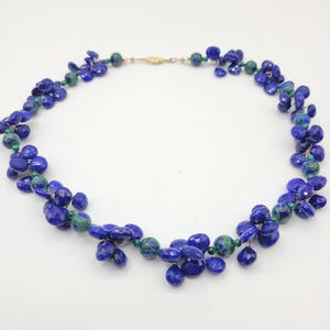 Statement piece necklace with wire-wrapped and clustered lapis lazuli beads, smooth azurite and malachite beads & gold-tone, fishhook clasp