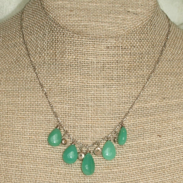 Stunning, AAA grade seafoam green chrysoprase polished drops and silver charms individually wire-wrapped on to a sterling silver chain