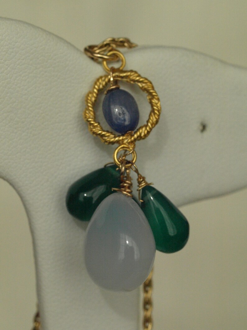 baby blue chalcedony drop and three polished green agate drops below rope-style vermeil ring with polished oval sapphire Large polished