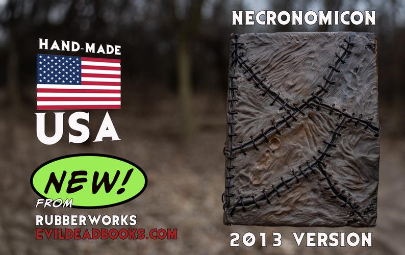 May include: A handmade, textured book cover with the title "Necronomicon" and "2013 Version" in white text. The cover is a mottled brown with black stitching. The American flag and the word "USA" are also visible.