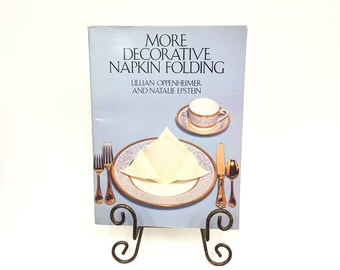 More Decorative Napkin Folding (1984) Lillian Oppenheimer& Natalie Epstein