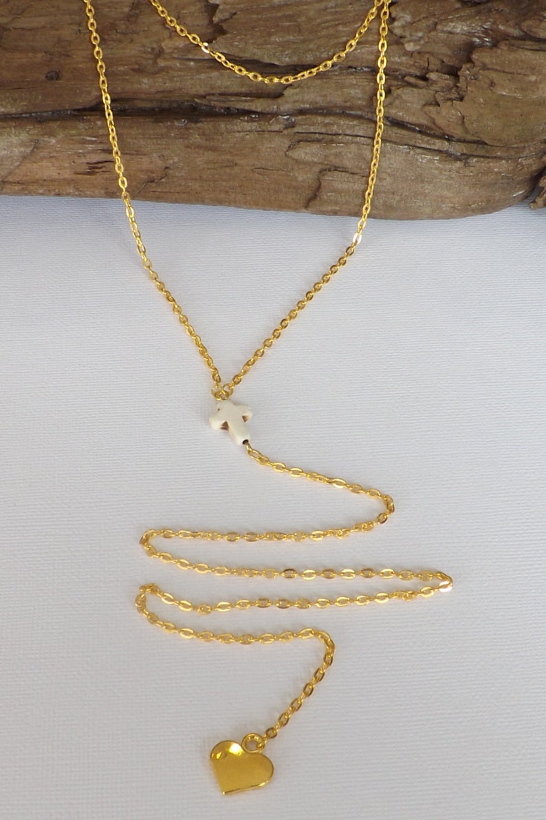 Ladies gold plated 2 strand Y style necklace with carved stone cross and gold plated heart