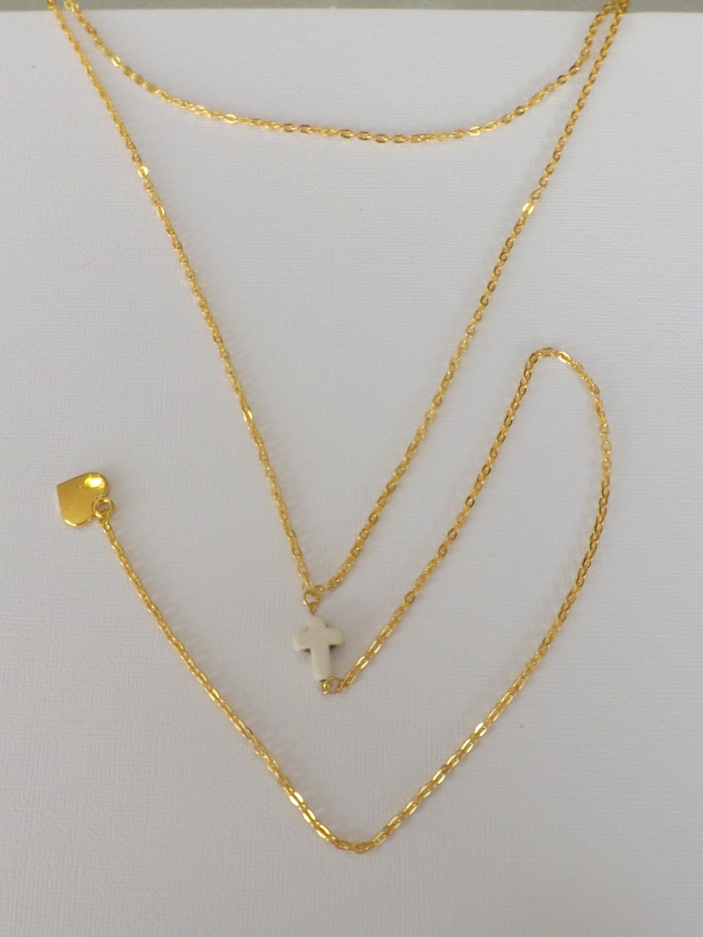 Ladies gold plated 2 strand Y style necklace with carved stone cross and gold plated heart