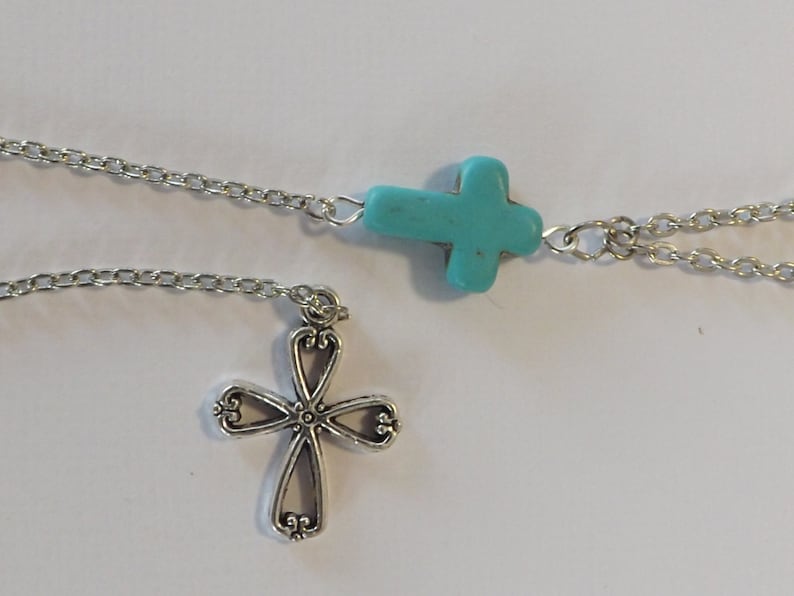 Ladies double strand cable chain necklace with Y style longer strand with blue carved stone cross