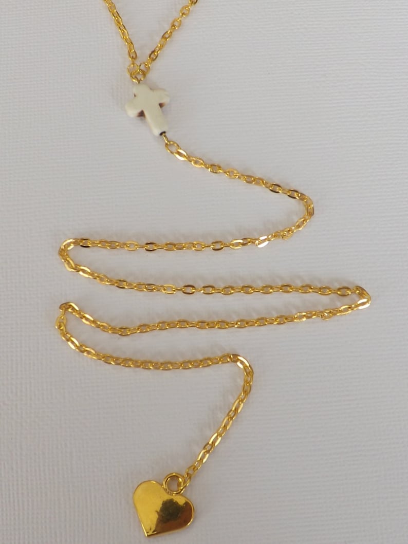 Ladies gold plated 2 strand Y style necklace with carved stone cross and gold plated heart