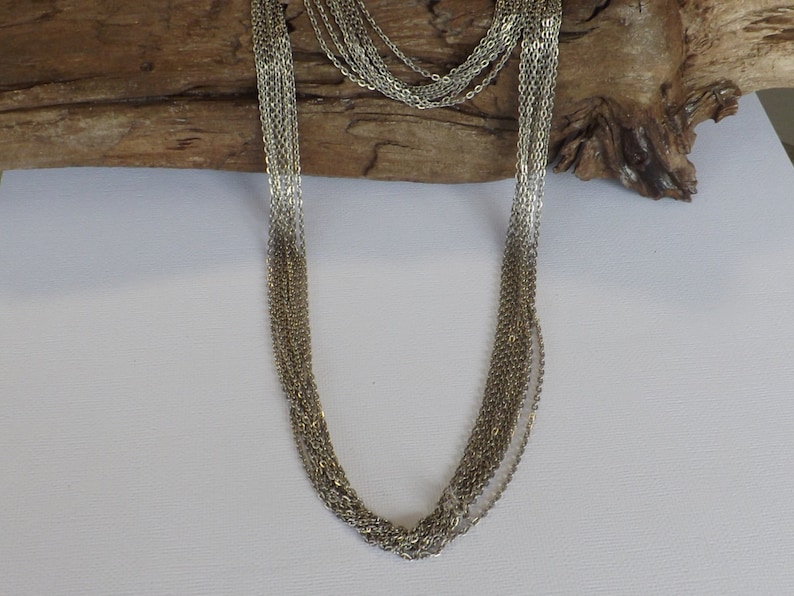 Multi strand chain necklace made with 2 lengths