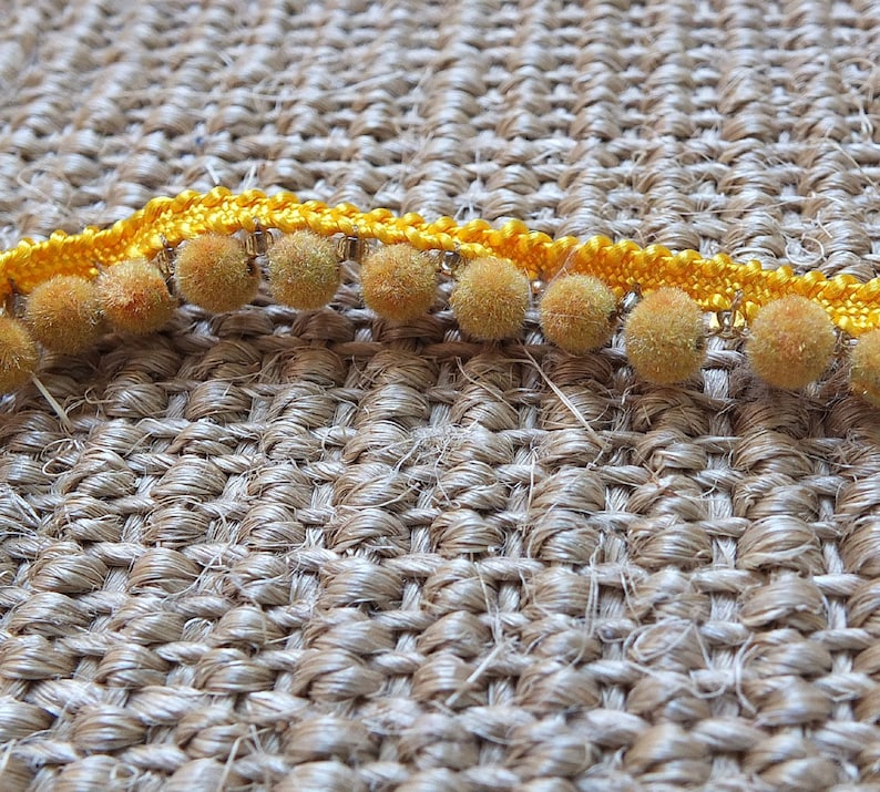 Yellow pom-pom trim