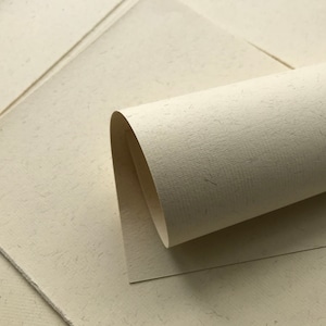 small pieces Hahnemuhle Buggra Bütten 130gsm Cream fleck ingres paper, lightly textured pastel laid paper acid free mould made drawing paper