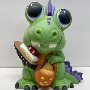 One of a kind handmade ceramic son of Zilla.