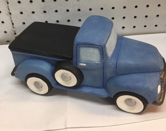 Handmade one of a kind ceramic truck with tonneau cover.