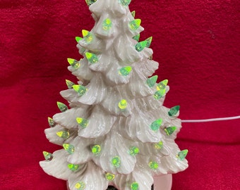 Handmade 10" ceramic white christmas tree with lIght green lights