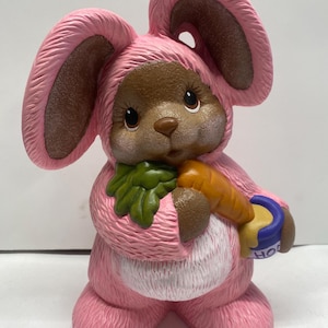 One of a kind hand made  ceramic bear in a bunny suit.