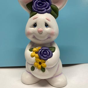 Large handmade ceramic standing bunny with flowers